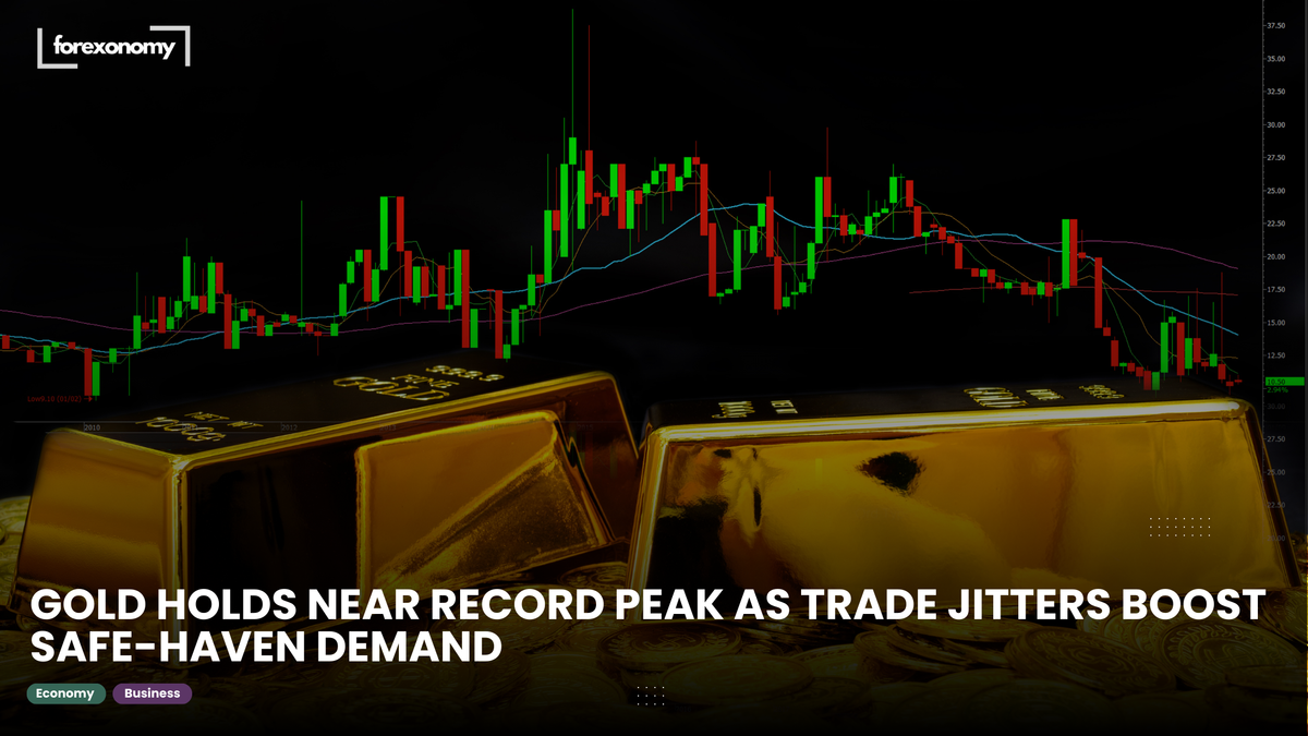 GOLD HOLDS NEAR RECORD PEAK AS TRADE JITTERS BOOST SAFE-HAVEN DEMAND