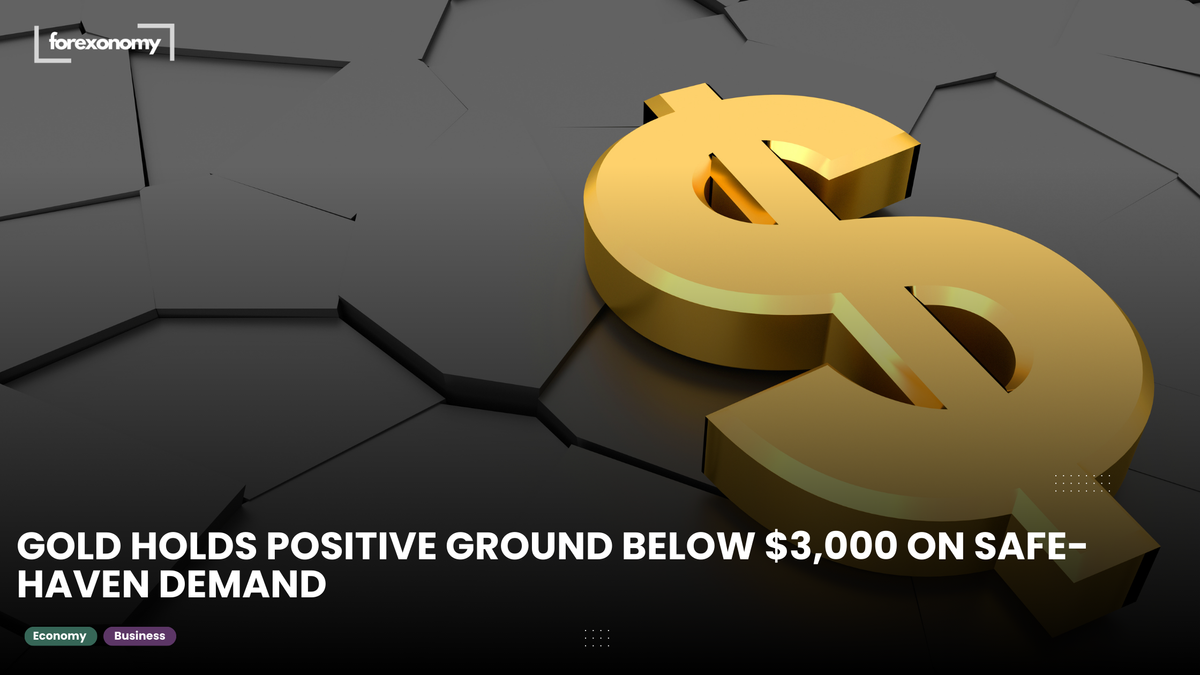 GOLD HOLDS POSITIVE GROUND BELOW $3,000 ON SAFE-HAVEN DEMAND
