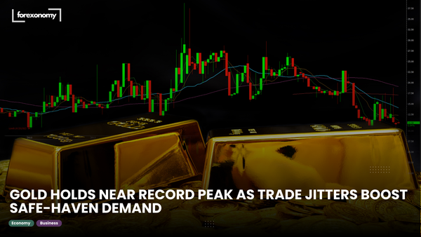 GOLD HOLDS NEAR RECORD PEAK AS TRADE JITTERS BOOST SAFE-HAVEN DEMAND