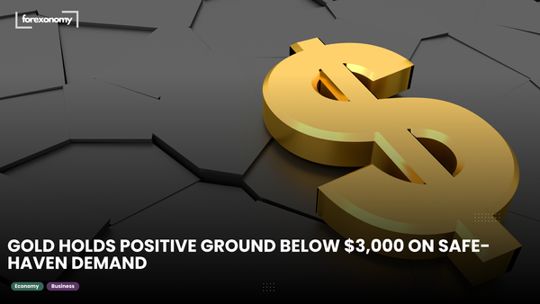 GOLD HOLDS POSITIVE GROUND BELOW $3,000 ON SAFE-HAVEN DEMAND